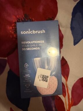 Sonic brush box never opened before (see the plastic film)